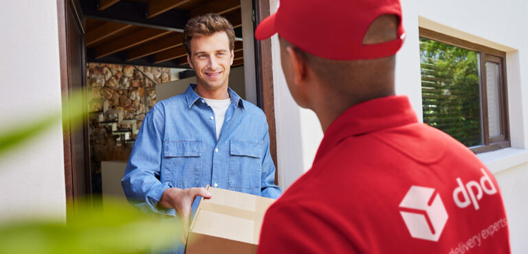 A customer receiving a parcel from a DPD Ireland driver